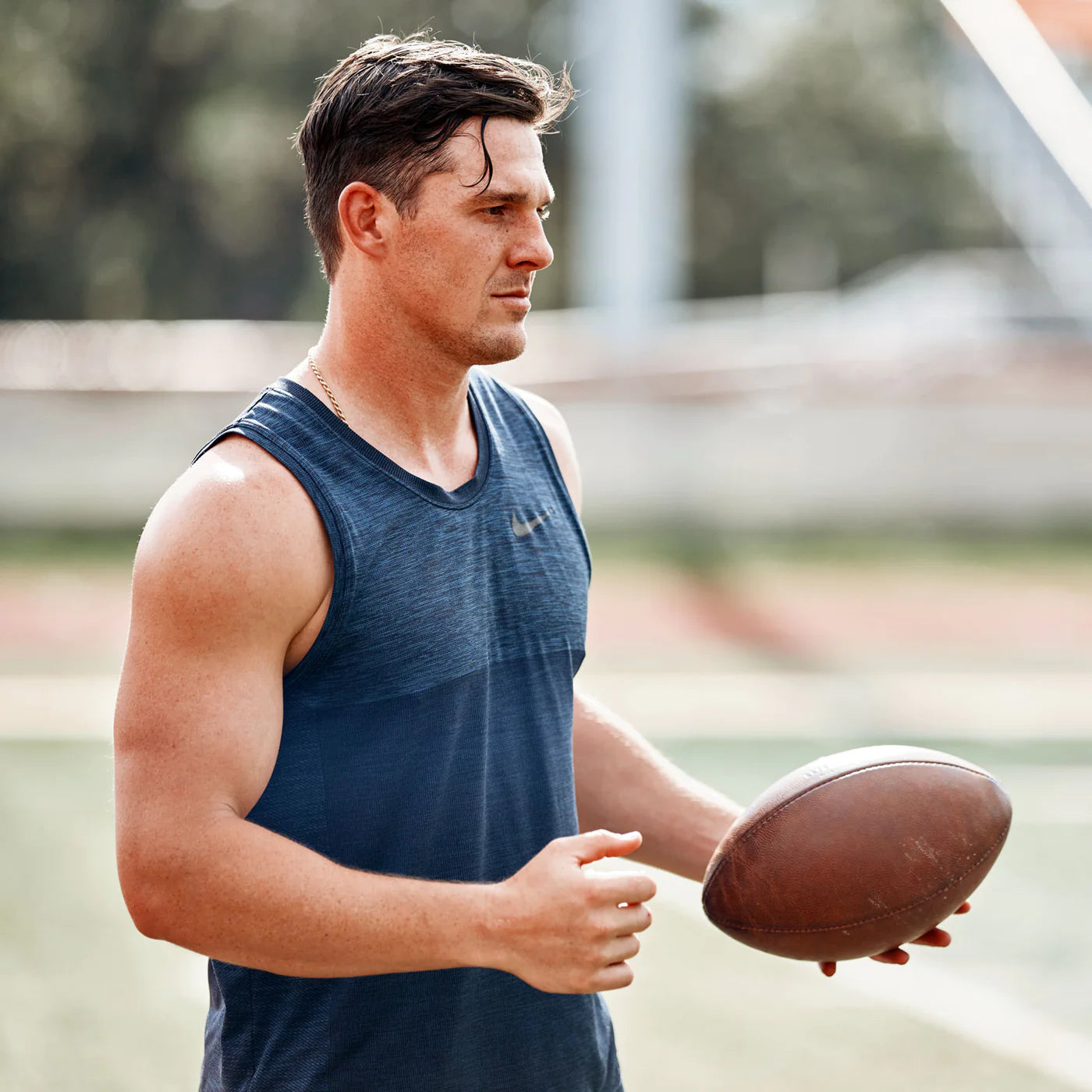 Johnny Townsend holding a football